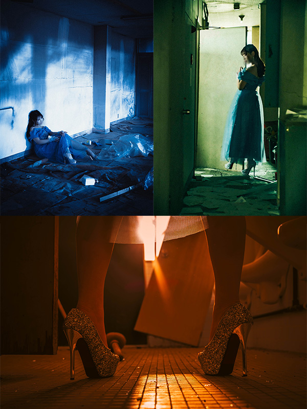 フォトグラファー赤木友厚による、福岡の廃墟スタジオ『朝日陸運大川営業所』での撮影を捉えた3枚の画像のコラージュ。左上は暗いコンクリート壁の隅に座る青いドレスのモデル、右上は朽ちたドアの前に立つモデル、下はゴールドのハイヒールとオレンジ色の光が当たる足元のクローズアップ。ちゃんみな『ハレンチ』 MV再現撮影の異なるシーン。顔にはぼかし処理。